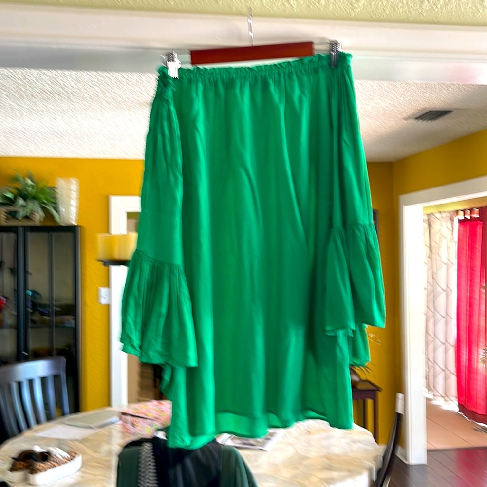 Bright green off the shoulder top with bell sleeves!